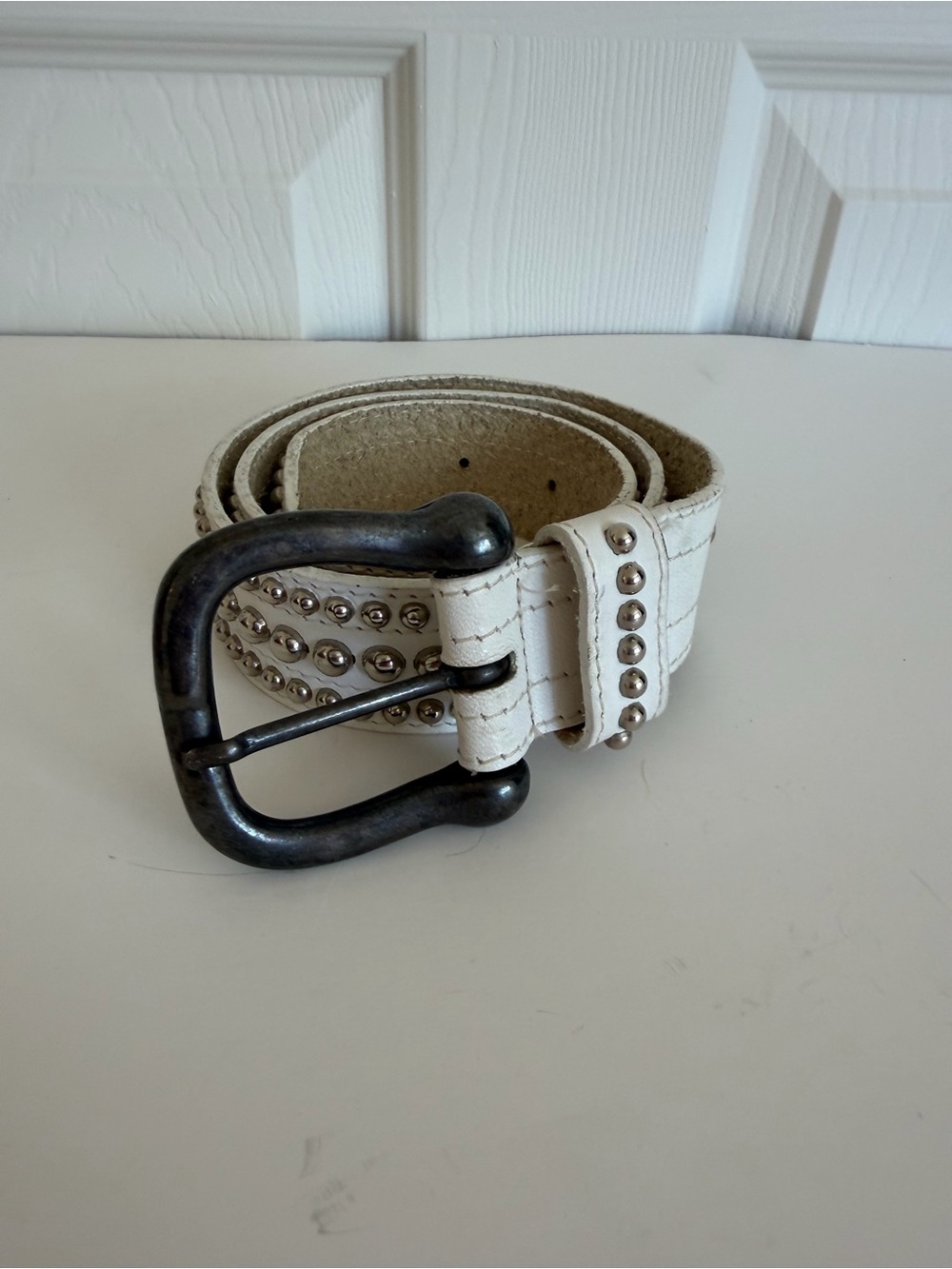 White Studded Leather Belt with Antique-Style Buckle. Metal studs Read
